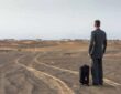 depositphotos 153356304 stock photo businessman in a desert with
